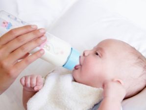 Infant Drinking from Bottle Infant Drinking from Bottle
